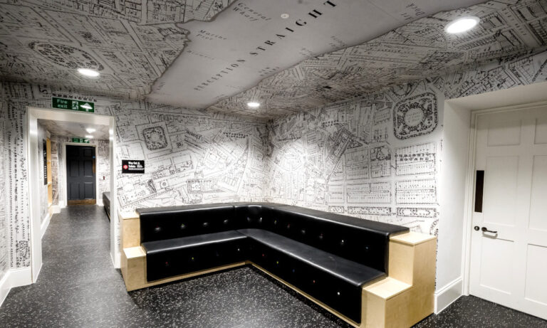 interior view bench with graphics in the walls and ceiling